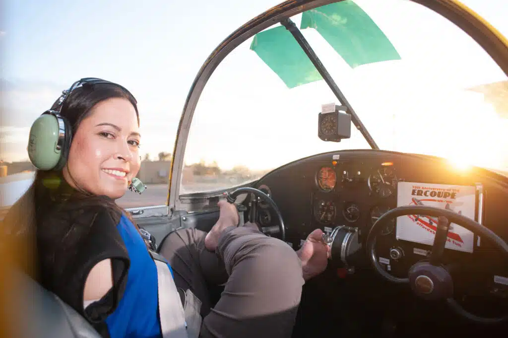 Jessica Cox smiling in plane